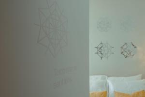 Postel nebo postele na pokoji v ubytování Pedra de Sal - Hostel & Suites