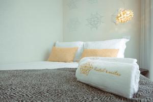 Postel nebo postele na pokoji v ubytování Pedra de Sal - Hostel & Suites