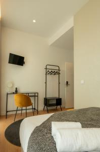 Postel nebo postele na pokoji v ubytování Pedra de Sal - Hostel & Suites