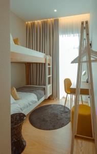 Postel nebo postele na pokoji v ubytování Pedra de Sal - Hostel & Suites