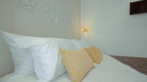 Postel nebo postele na pokoji v ubytování Pedra de Sal - Hostel & Suites