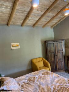 Un pat sau paturi într-o cameră la Cabaña La Guaranga
