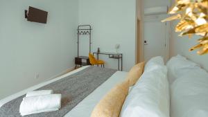 Postel nebo postele na pokoji v ubytování Pedra de Sal - Hostel & Suites