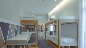Postel nebo postele na pokoji v ubytování Pedra de Sal - Hostel & Suites + 37 fotografií