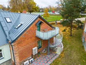 an overhead view of a house with a balcony at Apteegimaja Apartment in Rõngu