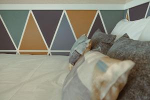 Postel nebo postele na pokoji v ubytování Pedra de Sal - Hostel & Suites