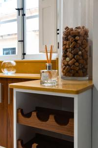 a table with a pile of rocks on it at Modern Central 2BR Flat in Valletta in Valletta