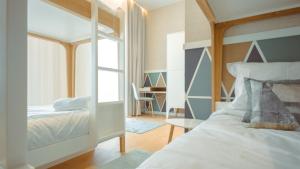 Postel nebo postele na pokoji v ubytování Pedra de Sal - Hostel & Suites