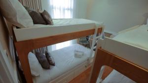 Postel nebo postele na pokoji v ubytování Pedra de Sal - Hostel & Suites