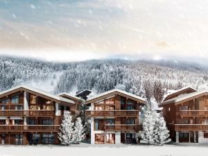 een resort in de bergen met met sneeuw bedekte bomen bij Appartement Courchevel, 4 pièces, 6 personnes - FR-1-568-40 in Courchevel