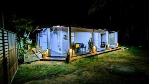 a small house with a porch at night at Jennifer's Villa in Negombo