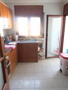 a kitchen with a sink and a window at Ebro Escape Luxury Apartment in Móra d'Ebre