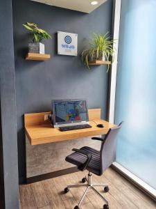 Una televisión o centro de entretenimiento en ibis budget Iquique