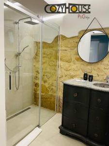 a bathroom with a shower and a sink and a mirror at Cozy House in Enna +29 photos