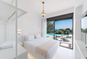 Katil atau katil-katil dalam bilik di Villa Gaia - Divine private villa with pool, close to beach +16 gambar