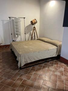 Ένα ή περισσότερα κρεβάτια σε δωμάτιο στο Casa Lavanda - Podere Fossaccio
