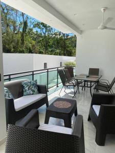 Posezení v ubytování Bel appartement neuf en loma