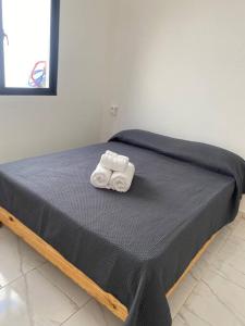 Postel nebo postele na pokoji v ubytování Bel appartement neuf en loma