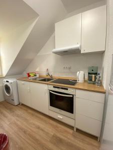 Kuchyň nebo kuchyňský kout v ubytování Annie´s Appartements