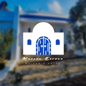 a logo for a modern church with a door at Maison eirene in Hammamet