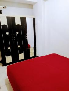 Een bed of bedden in een kamer bij Indah property