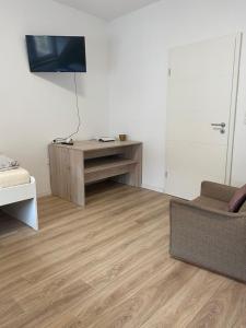 TV a/nebo společenská místnost v ubytování Annie´s Appartements