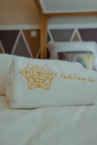 Postel nebo postele na pokoji v ubytování Pedra de Sal - Hostel & Suites