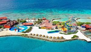 an aerial view of a water park in the ocean at Hidden Villa Aruba in Oranjestad