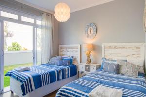 Ένα ή περισσότερα κρεβάτια σε δωμάτιο στο Seaforth Terrace