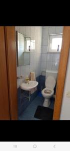 Um banheiro em Villa Krvavac