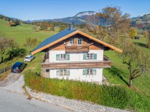 an overhead view of a house with a roof at Landhaus Platzl in Hopfgarten im Brixental