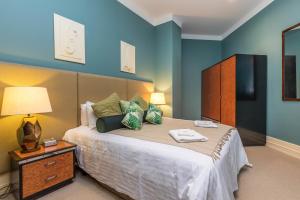 Katil atau katil-katil dalam bilik di Homey Deluxe Space - Heritage Complex