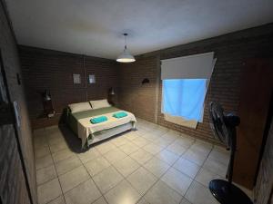 Ένα ή περισσότερα κρεβάτια σε δωμάτιο στο La Vaca, Casa de Campo