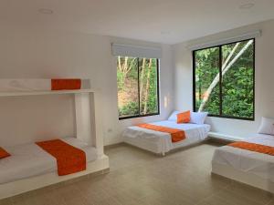 Un ou plusieurs lits dans un hébergement de l'établissement Casa Quinta Samay