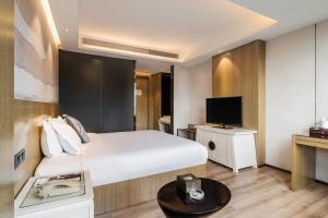 TV o dispositivi per l'intrattenimento presso Paco Hotel Shuiyin Road Guangzhou-Free bus Canton Fair