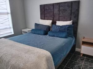 Ein Bett oder Betten in einem Zimmer der Unterkunft R & E Good vibes