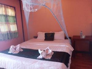Posteľ alebo postele v izbe v ubytovaní Champa Guesthouse