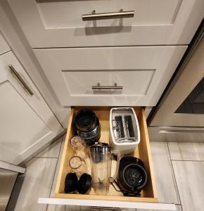 a kitchen with a drawer with a blender on it at The Relaxation Oasis in Philadelphia