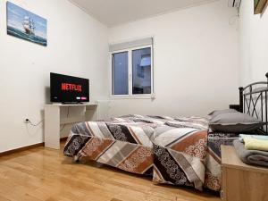 Кровать или кровати в номере 3-bedroom Parkside apartment