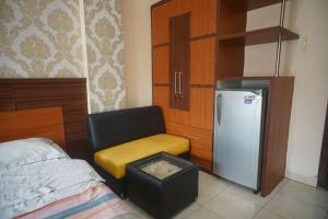 Η κουζίνα ή μικρή κουζίνα στο Pineapple Mansion Guest House Solo