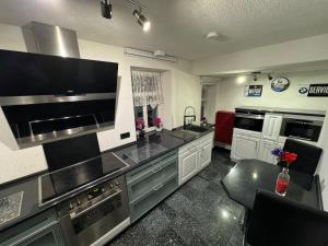Kuchyň nebo kuchyňský kout v ubytování Ferienhaus an der “Ilse”