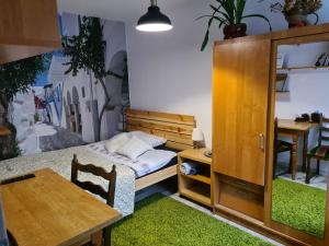 Katil atau katil-katil dalam bilik di Apartament Bema