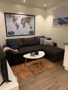 Posezení v ubytování Gimle cozy apartment