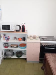 Kuchyň nebo kuchyňský kout v ubytování Casa Piacquadio