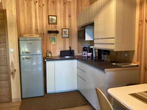 Η κουζίνα ή μικρή κουζίνα στο Le chalet Hosta