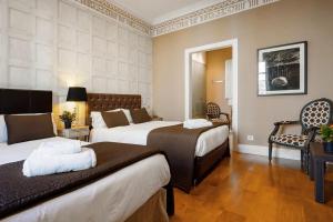 Postel nebo postele na pokoji v ubytování HoHomes - Luxury Palacete