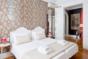 Postel nebo postele na pokoji v ubytování HoHomes - Luxury Palacete