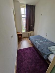 Postel nebo postele na pokoji v ubytování J&J