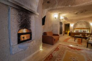 Posezení v ubytování Roma Cave Suite