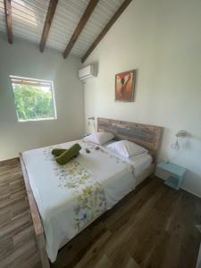 מיטה או מיטות בחדר ב-Ti-Kaz Gwada Le Gosier
